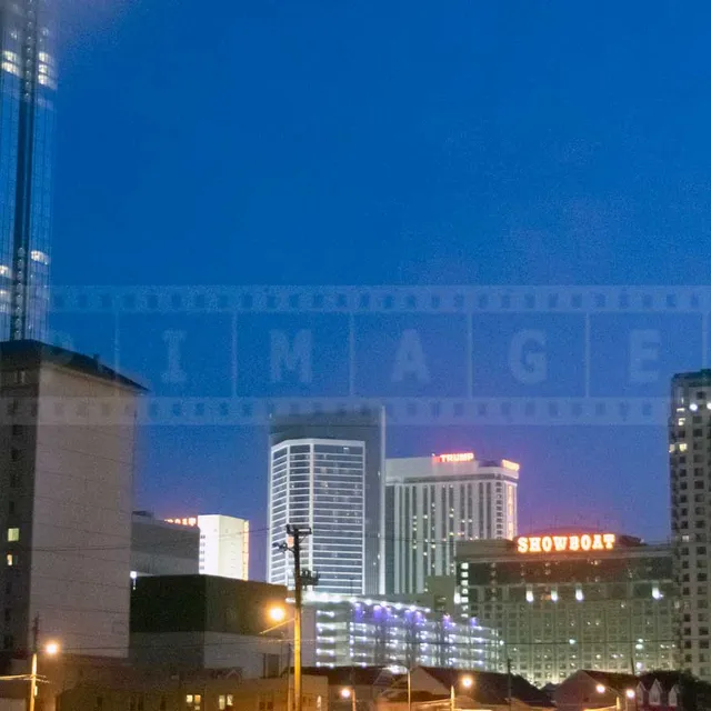 Night view of the Absecon lighthouse and casinos in Atlantic City