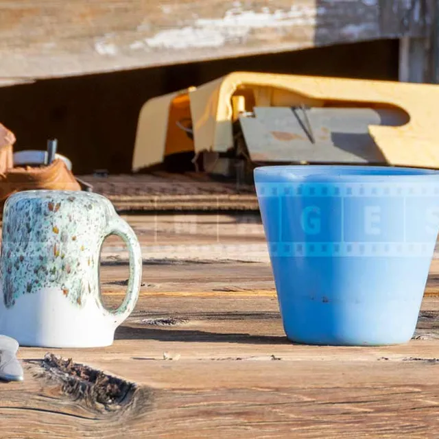 Details of a table with knife, fork and cups, meal that stretched forever