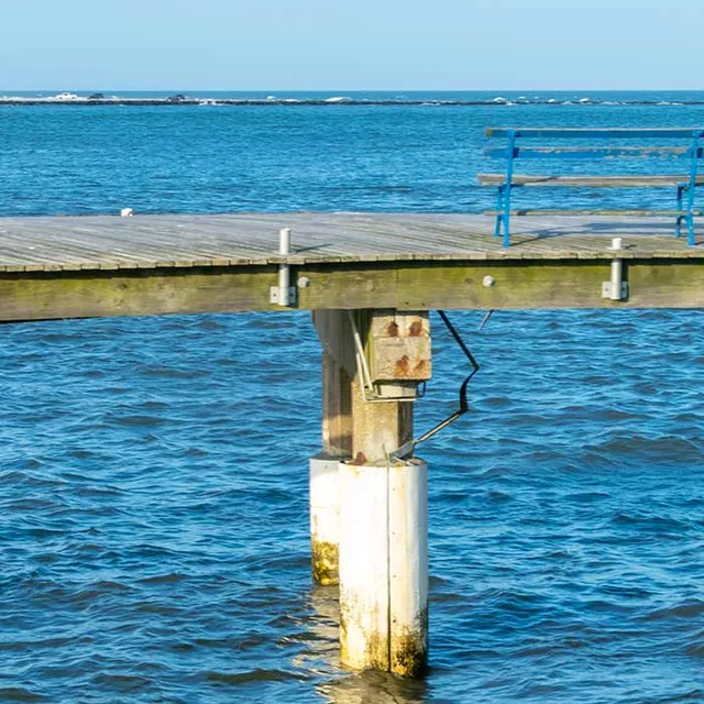 Remnants of the boardwalk with a bench in Atlantic City