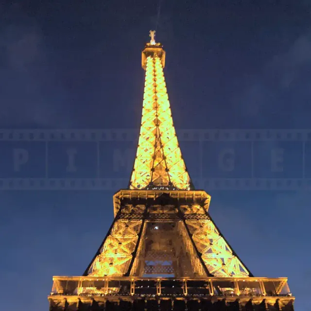 beautiful eifel tower with lights at dusk