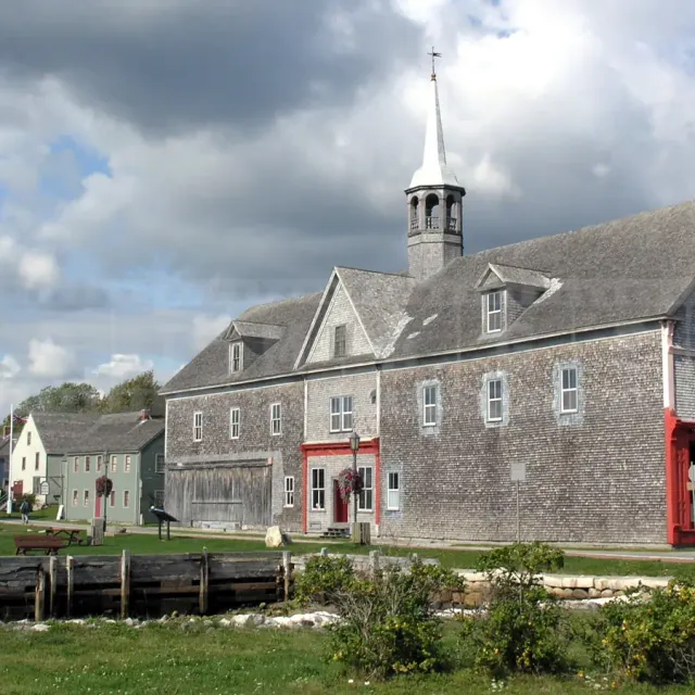 Old wooden buildings on waterfront in Shelburne, NS, Canada