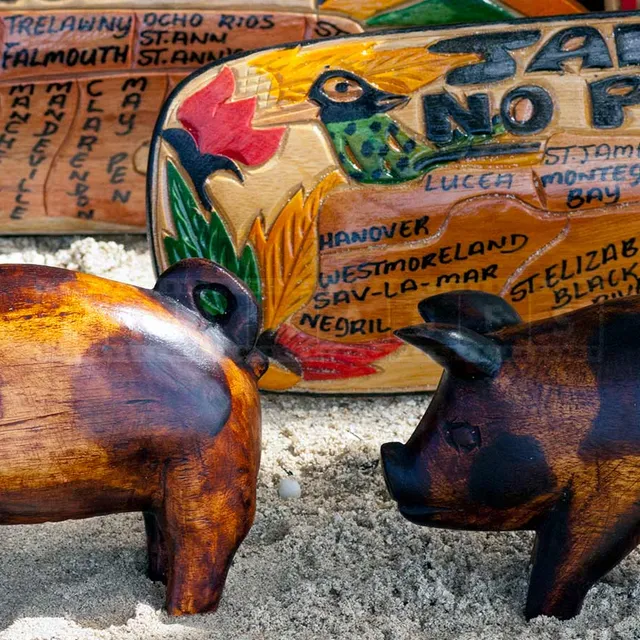 beachfront market with jamaican wood carvings