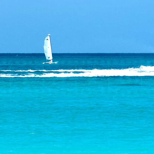 sailing boat, sea doo and motor boat active watersports in Jamaica