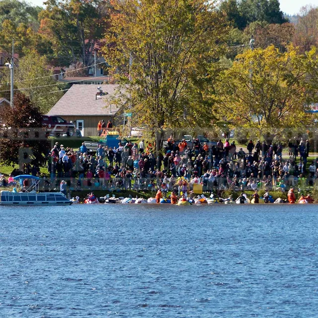 pumpkin boats lined up at the start of the race in Windsor, Nova Scotia