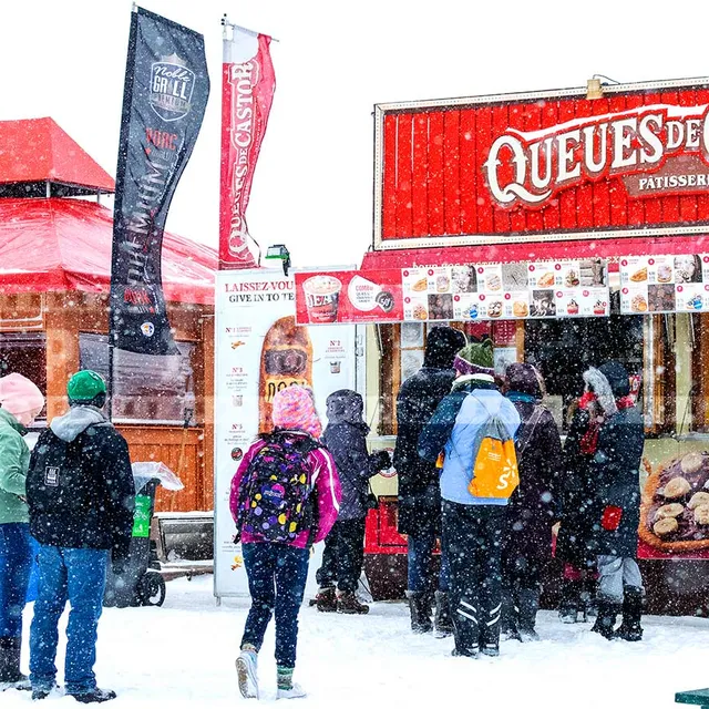 Line ups in winter to street food kiosks - barbecue and beaver tails