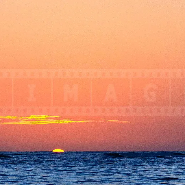 sun rising above the ocean in punta cana