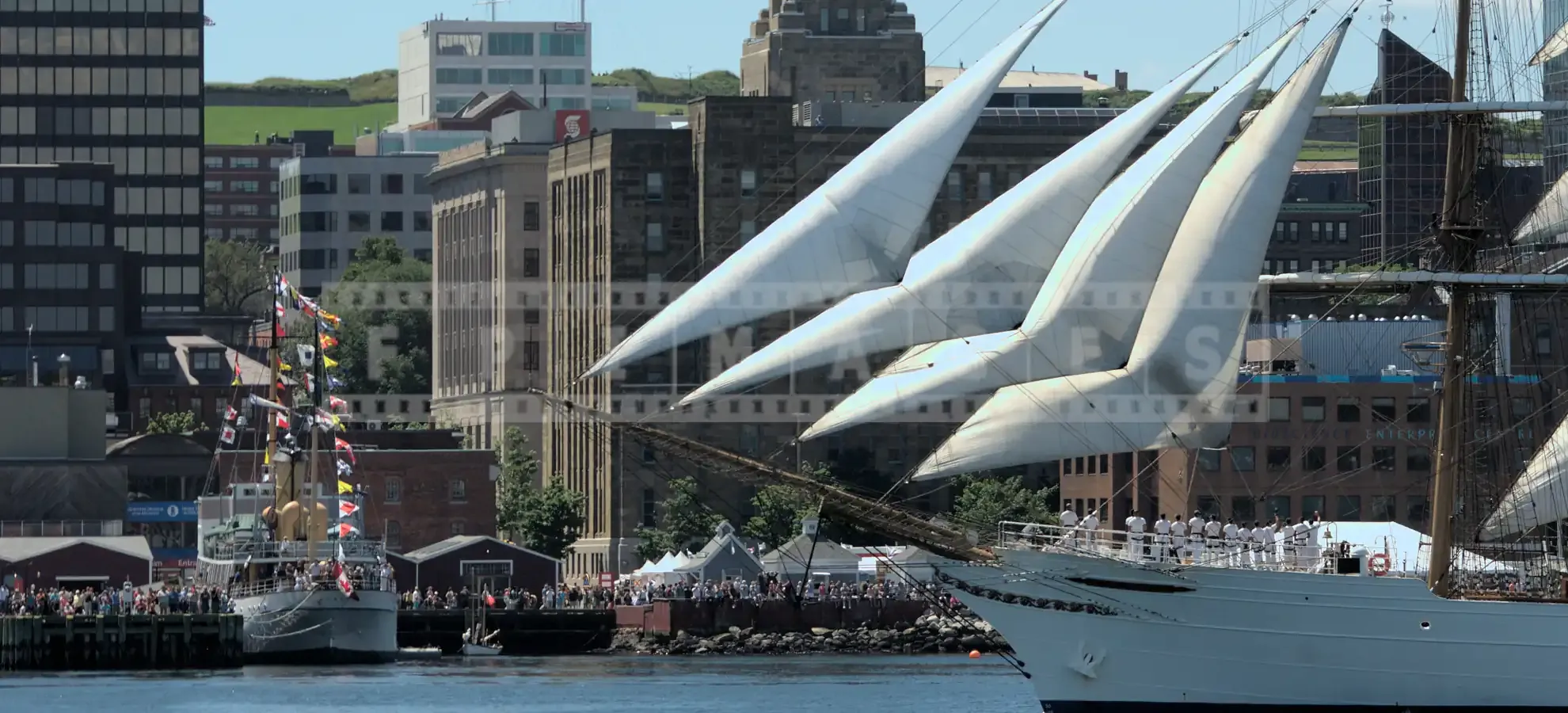 tall ship sailing by Halifax waterfront