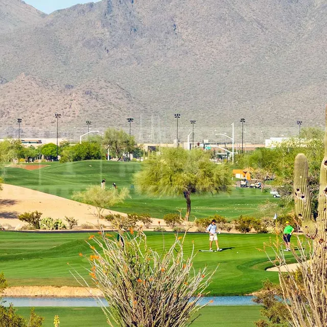 Scenic golf course picture with mountains