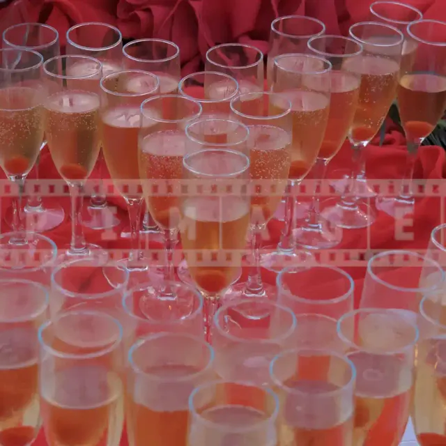 Champagne glasses arranged in the shape of heart for Valentines day