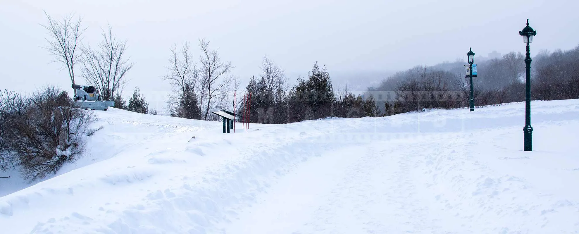 winter trail in plains of abraham park in quebec city